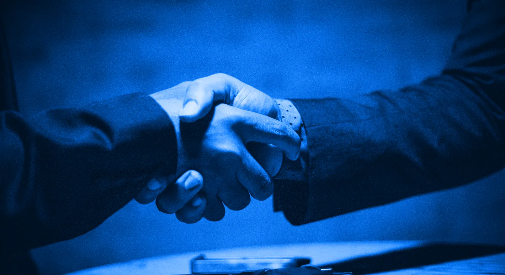 Two people shaking hands